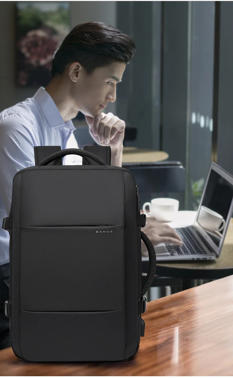 Urban Voyager: Waterproof Business Backpack with USB Charging